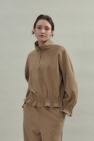 フローレント/FLORENTのハーフジップ ギャザー デザイン トップス